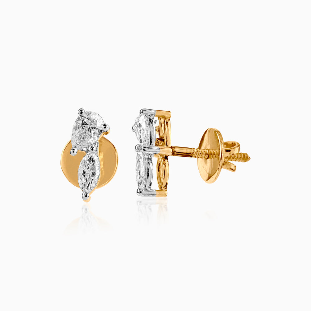 Gold and diamond stud earrings with two-tone marquise and round diamond design