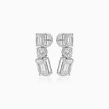 Diamond earrings with emerald-cut stones in geometric three-tier design on white background
