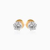 Gold stud earrings with round brilliant diamond solitaires in prong settings
