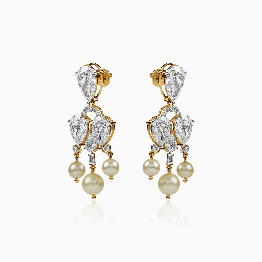 Diamond and pearl chandelier earrings in gold with teardrop stones and hanging pearls