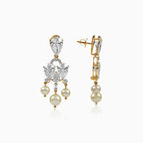 Diamond and pearl chandelier earrings in gold with pear-cut stones and hanging pearl drops