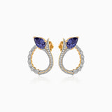 Gold hoop earrings with blue sapphire stones and diamond-encrusted band
