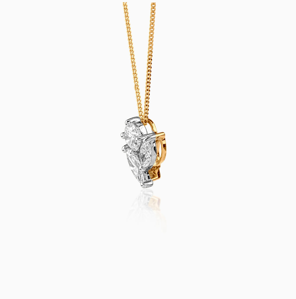 Diamond pendant with white and gold intertwined on delicate chain