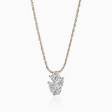 Two-toned diamond pendant necklace with silver and gold chain, sparkling cluster design