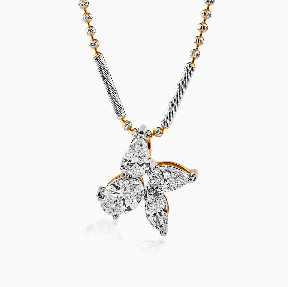 Diamond butterfly pendant on two-tone metallic chain with gold and silver links