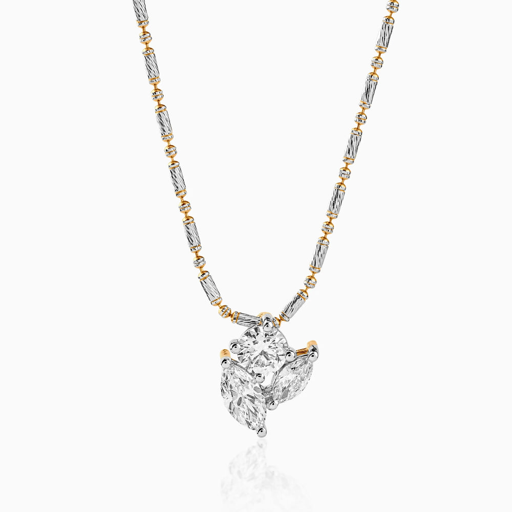 Two-tone diamond pendant necklace with silver and gold chain, sparkling cluster pendant