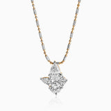 Two-tone gold and silver necklace with diamond cluster pendant in geometric star shape
