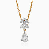 Gold chain with multi-diamond pendant, featuring white diamond shapes and teardrop centerpiece.