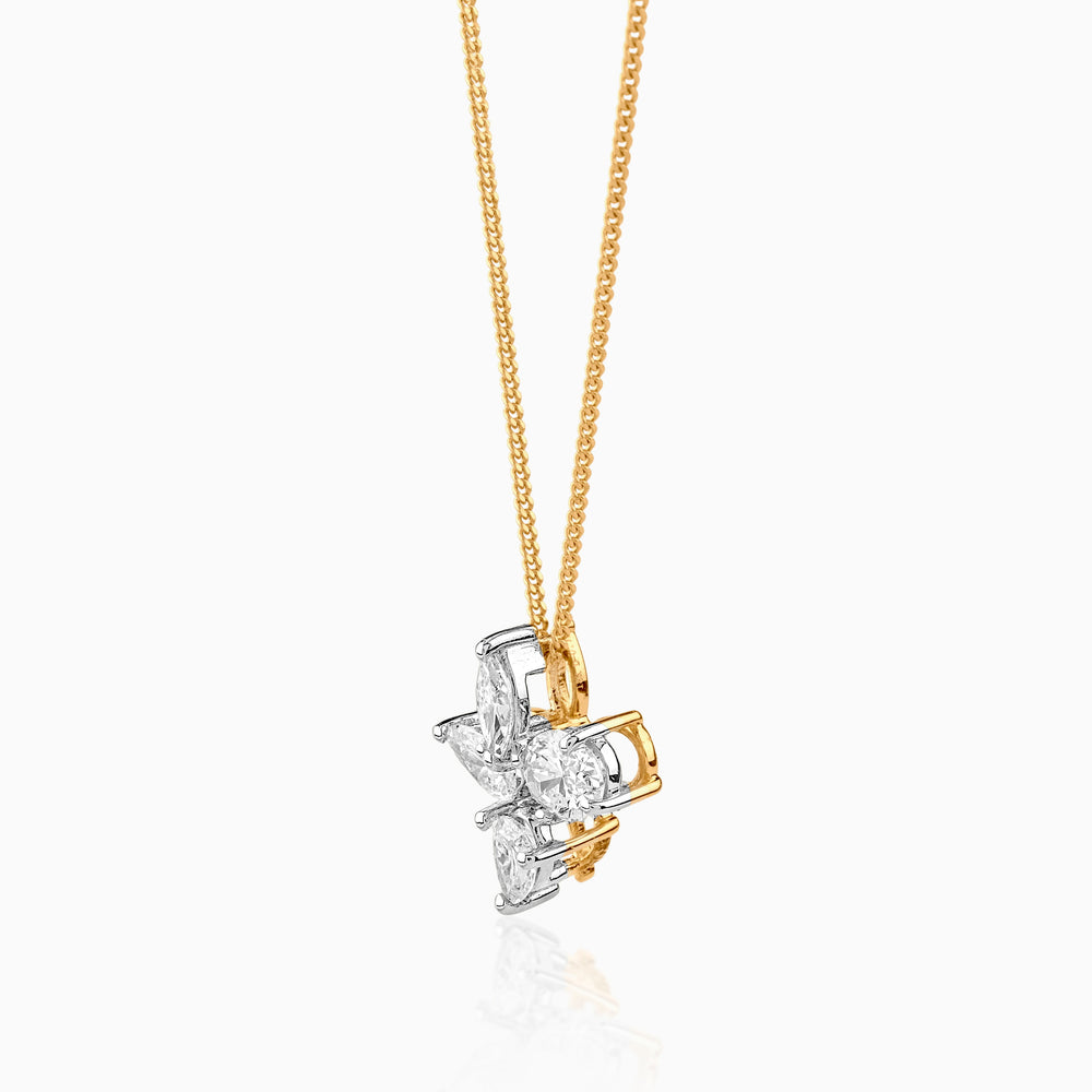 Gold chain with white diamond cluster pendant in star-like arrangement
