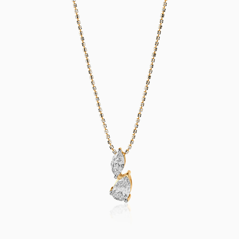 Gold and silver necklace with two marquise and pear-shaped diamond pendants