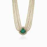 Multi-strand pearl necklace with emerald pendant surrounded by diamond halo