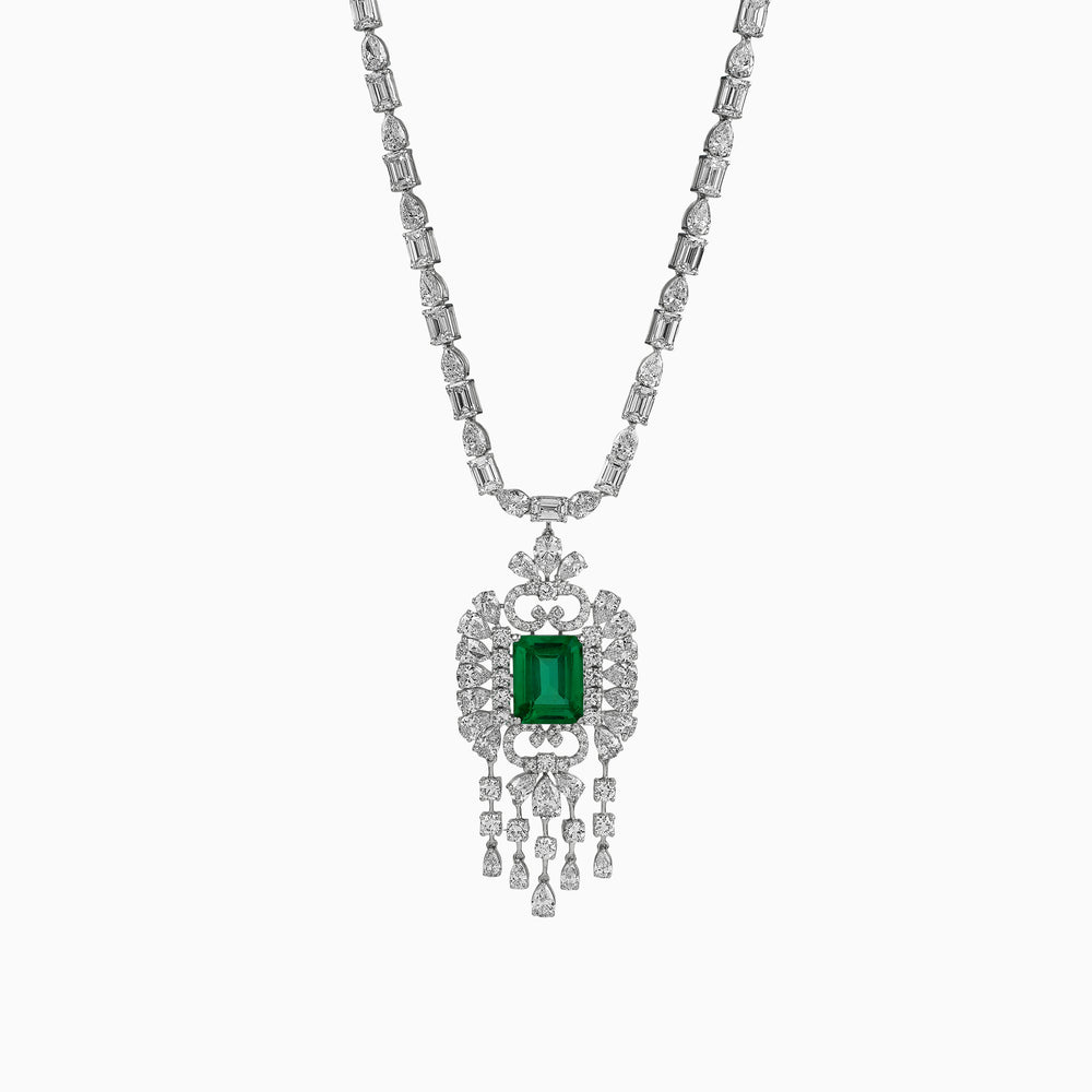 Emerald pendant with diamond-encrusted white gold necklace, ornate vintage design