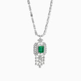 Emerald diamond pendant necklace with intricate white gold and diamond chandelier design