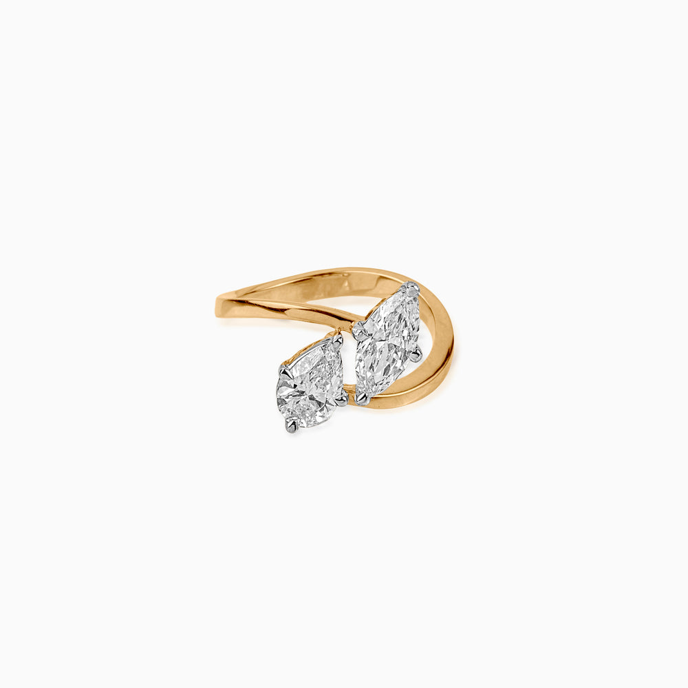 Gold ring with two marquise-cut diamonds in elegant twisted setting