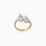 Two-tone gold ring with pear-shaped diamond toi et moi design, sparkling pavé band