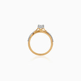 Gold engagement ring with diamond, white background, side view