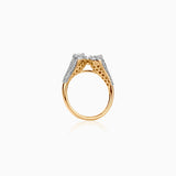 Gold ring with diamond-encrusted sides and intricate filigree metalwork