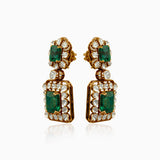 Emerald and diamond statement earrings in ornate gold setting