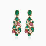 Ornate emerald and ruby chandelier earrings with diamond accents in gold setting